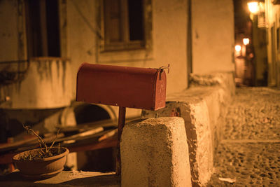 Red mailbox in a cozy street