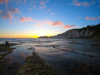 Scenic view of sea against sky during sunset