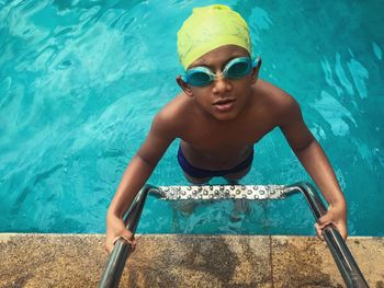 Portrait of boy in swimming pool