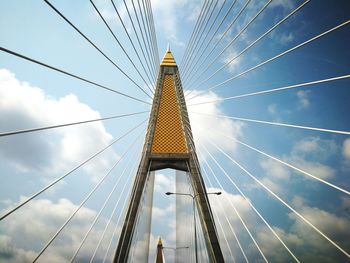 Low angle view of bridge against blue sky