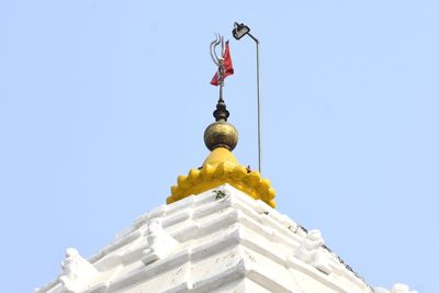 Low angle view of building against blue sky
