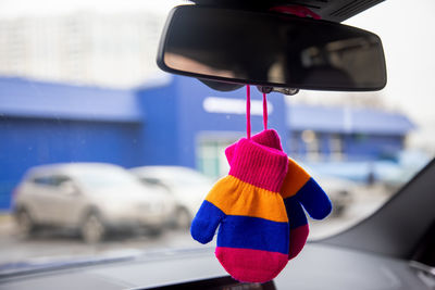 Close-up of umbrella in car