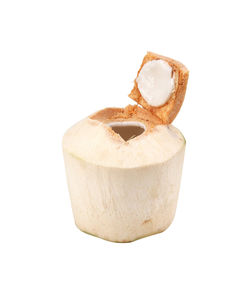 Close-up of cake against white background