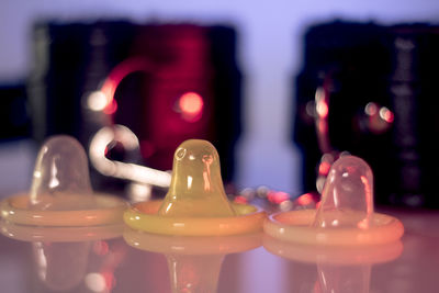 Close-up of condoms on table