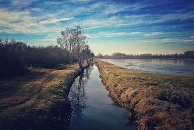 Scenic view of river against sky