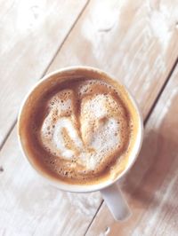 Close-up of cappuccino on table