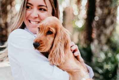 Portrait of woman with dog