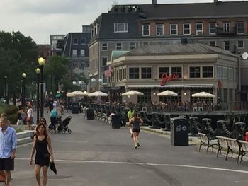 Woman standing in city
