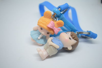 High angle view of stuffed toy against white background