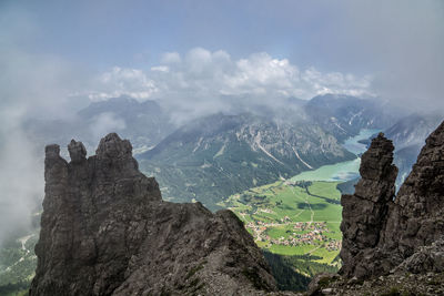 Scenic view of rocky mountains against sky