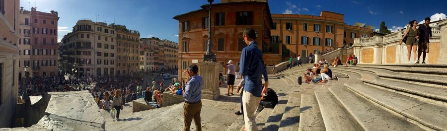 Panoramic view of people at spanish steps in city