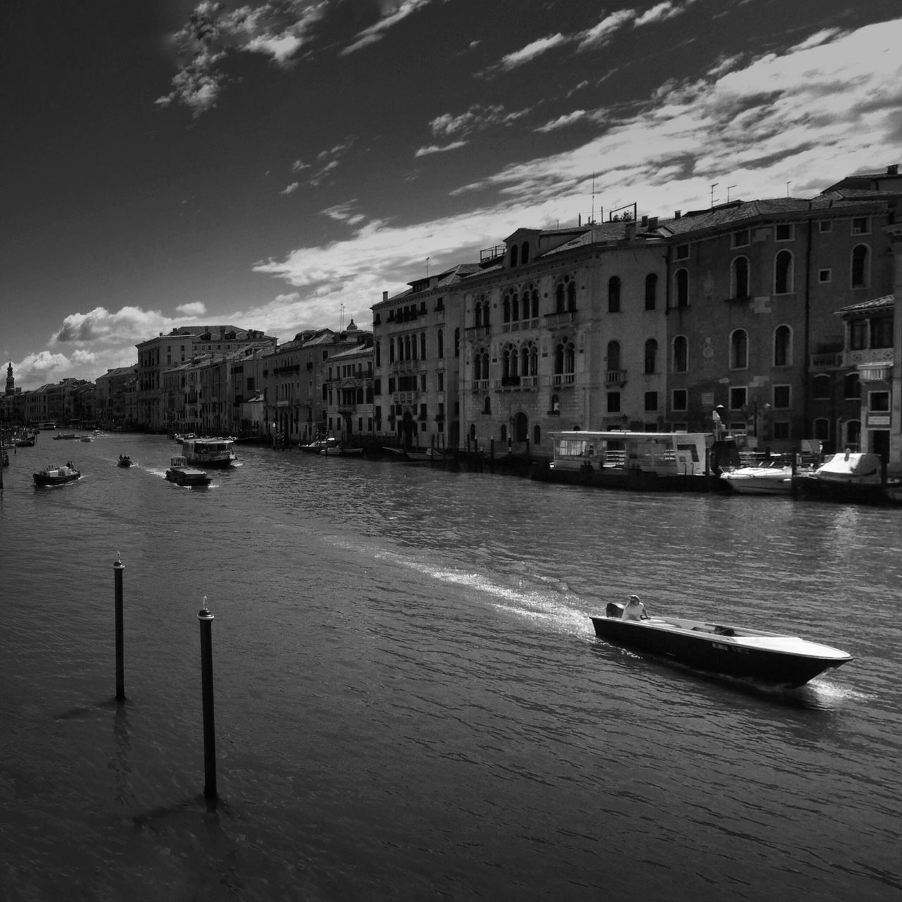 building exterior, architecture, nautical vessel, water, built structure, transportation, mode of transport, moored, boat, sky, waterfront, residential structure, city, canal, house, residential building, outdoors, river, sea, no people