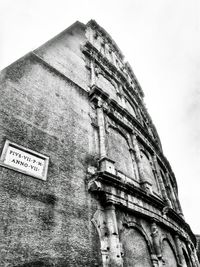 Low angle view of old building against sky