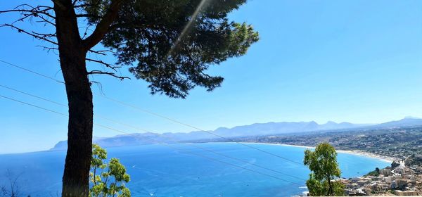 Scenic view of mountains against clear blue sky
