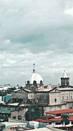 View of buildings in city against sky