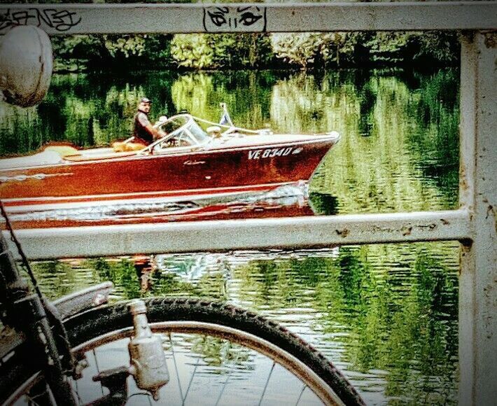 BOAT MOORED ON LAKE