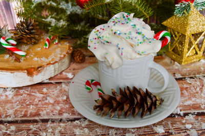 Close-up of christmas decorations on table