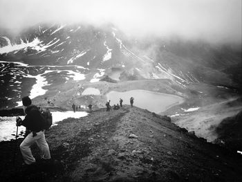 Woman standing on mountain