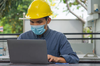 Man working with mobile phone