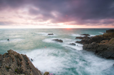 Scenic view of sea against sky during sunset