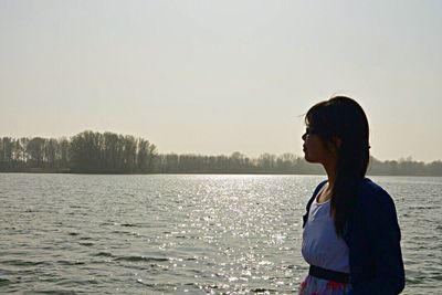 Woman swimming in lake