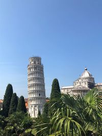 Low angle view of building against blue sky