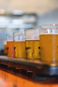 Close-up of beer glass on table