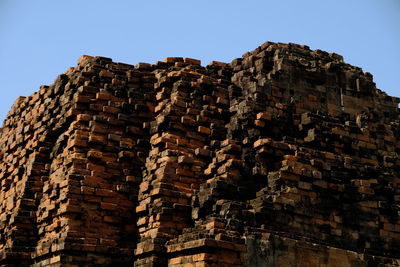 Low angle view of buildings against clear sky