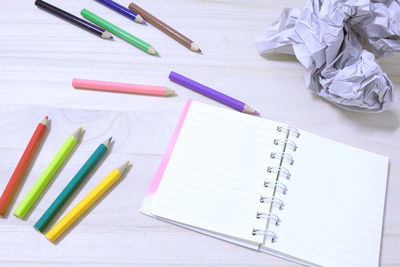 High angle view of colored pencils on table