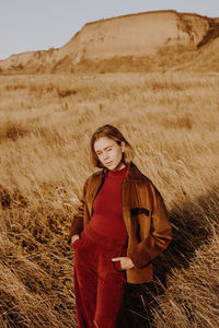 Woman standing on field