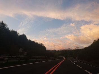 Empty road at sunset