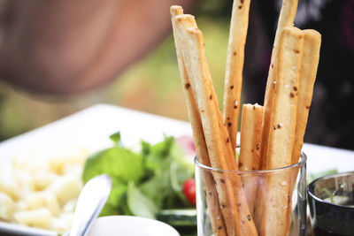 Close-up of breadsticks  on table