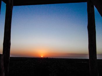 Scenic view of landscape against sky during sunset