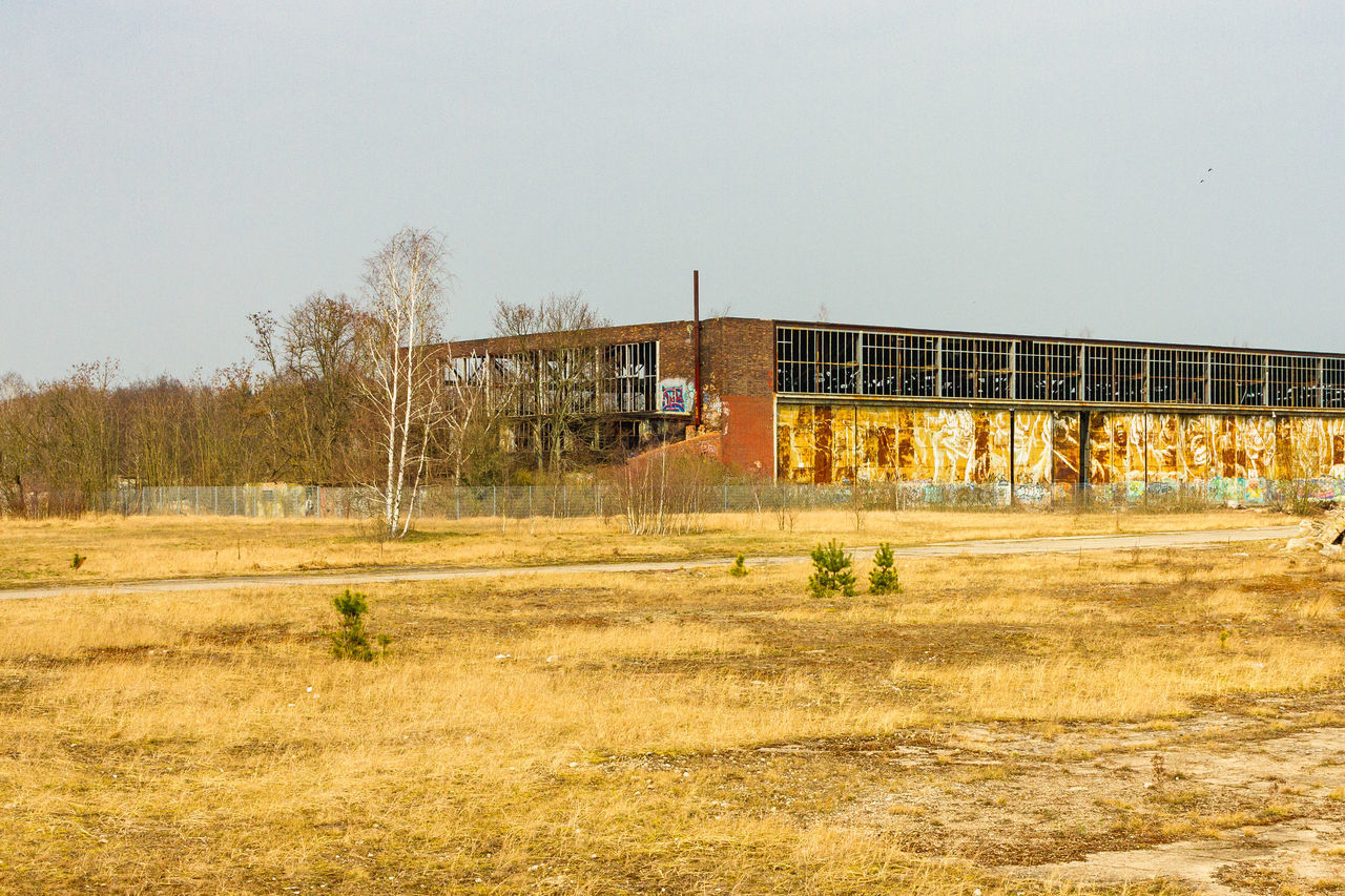 ABANDONED BUILDING AGAINST CLEAR SKY