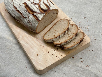 High angle view of bread on cutting board