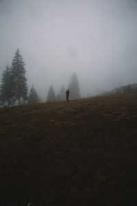 Scenic view of landscape against sky during winter