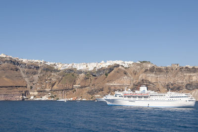 Scenic view of sea against clear blue sky