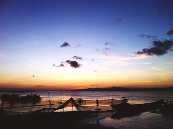 Scenic view of sea at sunset