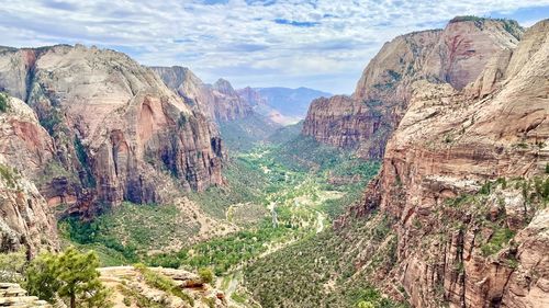 Panoramic view of landscape with mountain range in background