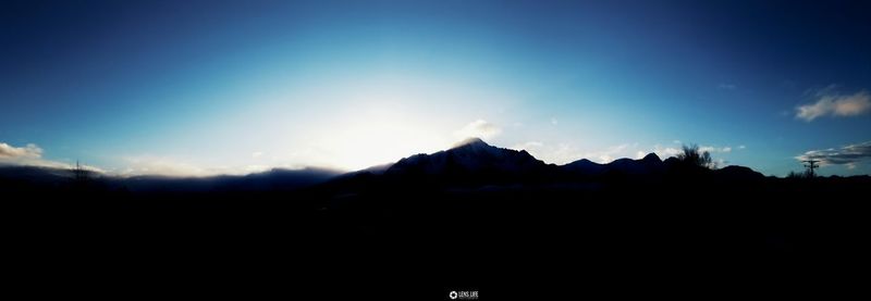 Silhouette of mountains against sky