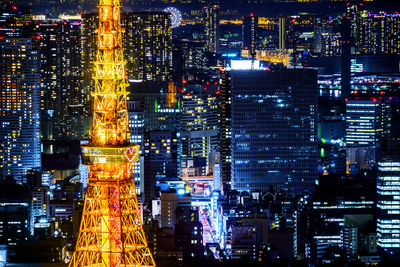 Illuminated buildings in city at night