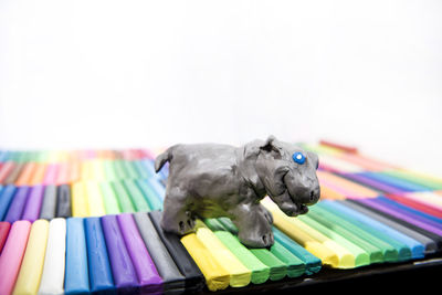 Close-up of stuffed toy over white background