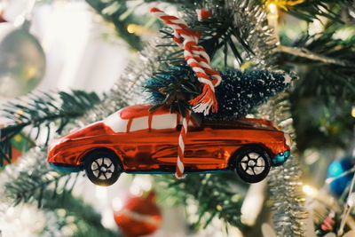 Close-up of decorations hanging on christmas tree