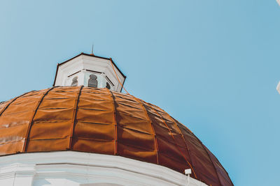 Low angle view of building against clear blue sky