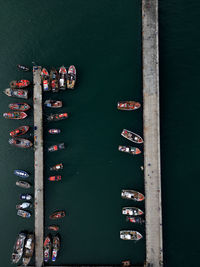 High angle view of boats moored in sea