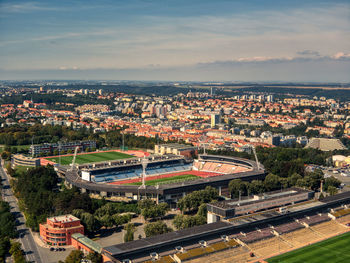 High angle view of buildings in city against sky