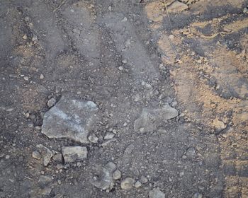 Full frame shot of footprints on sand