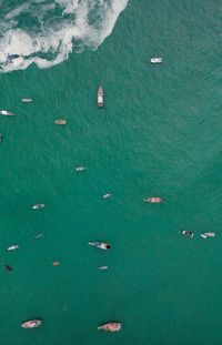 Aerial view of fishing boats on sea