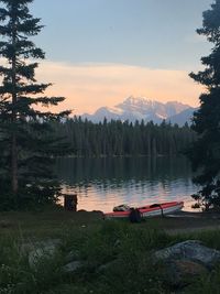 Scenic view of lake against sky during sunset