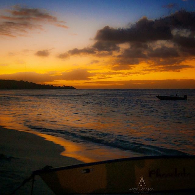 sunset, water, sea, orange color, scenics, tranquil scene, sky, beauty in nature, horizon over water, tranquility, idyllic, beach, nature, cloud - sky, shore, reflection, nautical vessel, silhouette, dramatic sky, dusk